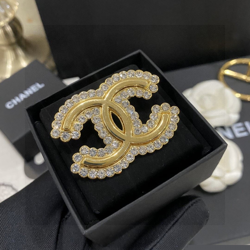 Ch*el brooches